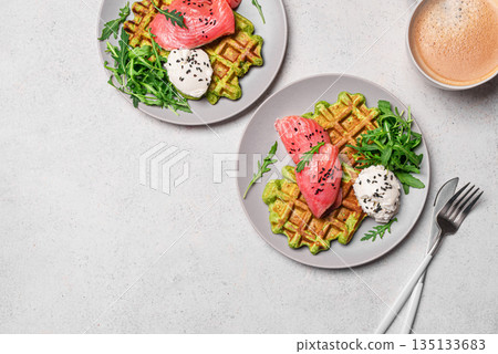 Healthy breakfast with green avocado based waffles and salmon Healthy breakfast with green avocado based waffles and salmon 135133683