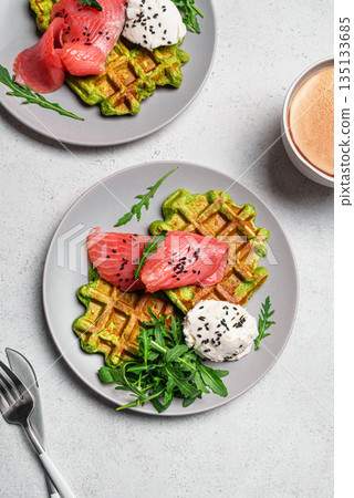 Healthy breakfast with green avocado based waffles and salmon Healthy breakfast with green avocado based waffles and salmon 135133685