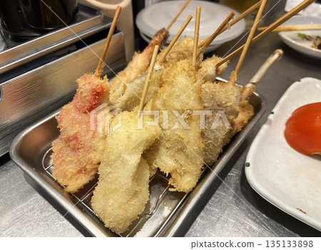 Osaka's specialty kushikatsu served on a tray Osaka's specialty kushikatsu served on a tray 135133898