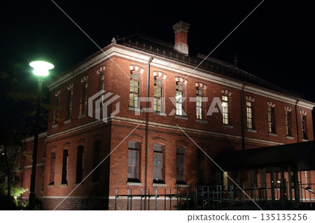 illuminated red brick building illuminated red brick building 135135256