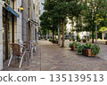 European-style streetscape with cobblestones and cafe terraces in Shiodome Italian Town, Tokyo 135139513