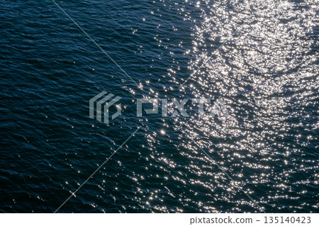 Sparkling ripples on the sea surface 135140423