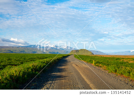 A straight road stretching to the horizon in the Nordic island nation of Iceland 135141452