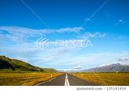 A straight road stretching to the horizon in the Nordic island nation of Iceland A straight road stretching to the horizon in the Nordic island nation of Iceland 135141454