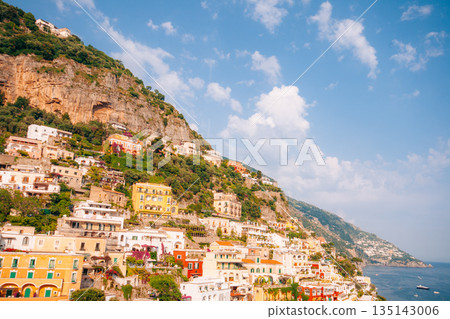 Colorful houses cling to a steep cliff overlooking the sea in Positano Italy Colorful houses cling to a steep cliff overlooking the sea in Positano Italy 135143006