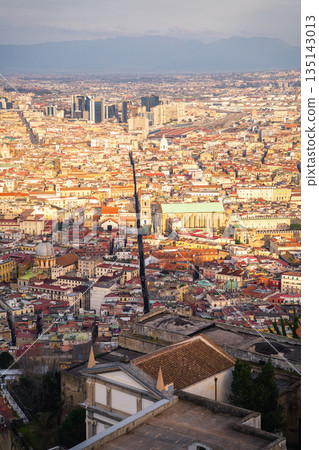 Naples Italy, spaccanapoli road from above with mountains in background. Naples Italy, spaccanapoli road from above with mountains in background. 135143013