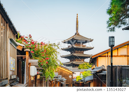 Traditional Japanese street scene with a pagoda in the background. Kyoto 135143027