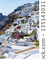 Santorini Greece: Tourists stay in whitewashed hotels and villas on the caldera 135143031