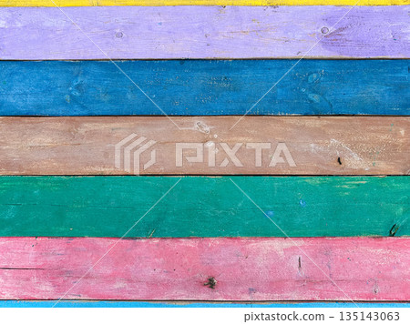 Multicolored wooden planks arranged horizontally 135143063