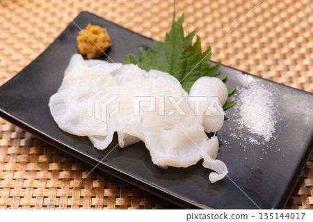 Delicious raw octopus sashimi Delicious raw octopus sashimi 135144017