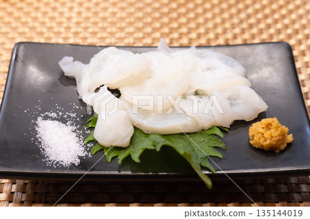 Delicious raw octopus sashimi Delicious raw octopus sashimi 135144019