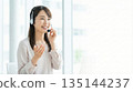 Smiling call center female operator 16:9 Customer support Guidance Customer service Intercom 135144237