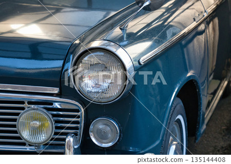Classic car headlight and body details 135144408