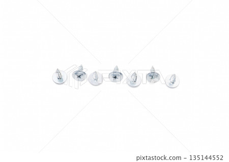Scattered wood screws isolated on white background Scattered wood screws isolated on white background 135144552