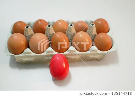 Red Dyed Easter Eggs and Natural Eggs in Carton Red Dyed Easter Eggs and Natural Eggs in Carton 135144718