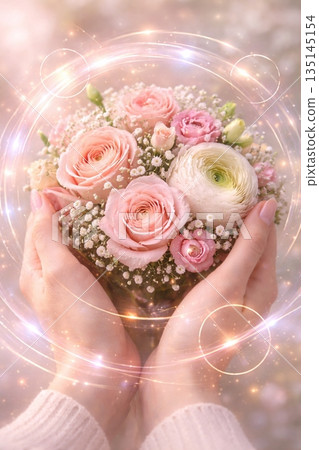 Gentle Hands Holding a Magical Garden Bouquet with Glowing Aura Gentle Hands Holding a Magical Garden Bouquet with Glowing Aura 135145154