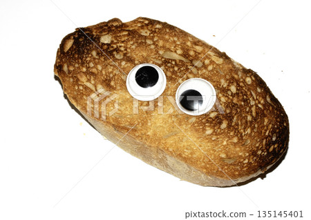 A Funny Burnt Toast Bread Slice Roll With Googly Wobble Eyes A Funny Burnt Toast Bread Slice Roll With Googly Wobble Eyes 135145401