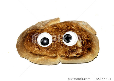 A Funny Burnt Toast Bread Slice Roll With Googly Wobble Eyes A Funny Burnt Toast Bread Slice Roll With Googly Wobble Eyes 135145404