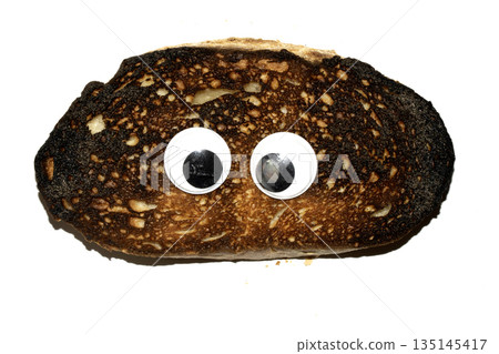 A Funny Burnt Toast Bread Slice Roll With Googly Wobble Eyes 135145417