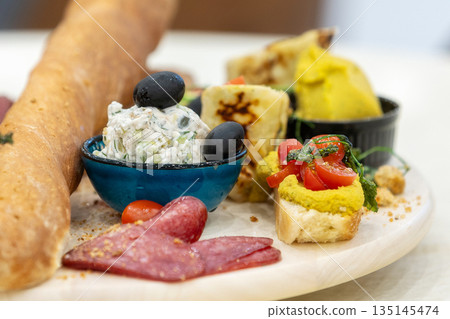 Red wine with charcuterie, cheese, grapes and snacks Red wine with charcuterie, cheese, grapes and snacks 135145474