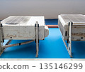 Two Air Conditioning Outdoor Units on External Wall. 135146299