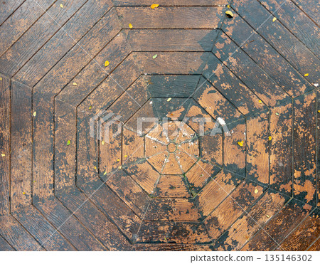 Geometric Octagon Wooden Bench Pattern in Public Park. Geometric Octagon Wooden Bench Pattern in Public Park. 135146302