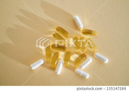 Omega 3 and vitamin capsules for daily health Omega 3 and vitamin capsules for daily health 135147269