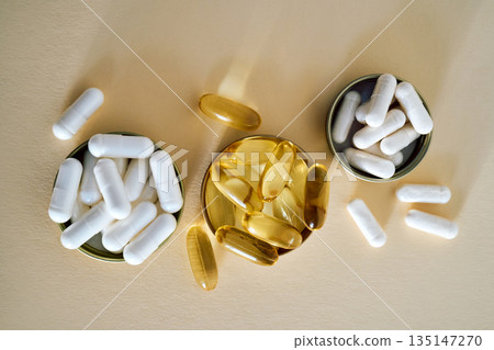 White capsules and omega 3 oil pills for health White capsules and omega 3 oil pills for health 135147270
