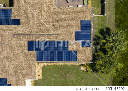 Autonomous home. Solar panels on house roof. Photovoltaic sells for producing clean ecological electric energy. Investing in renewable electricity for retirement income Autonomous home. Solar panels on house roof. Photovoltaic sells for producing clean ecological electric energy. Investing in renewable electricity for retirement income 135147392