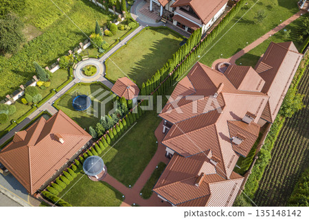 Aerial view of a residential new house. Aerial view of a residential new house. 135148142