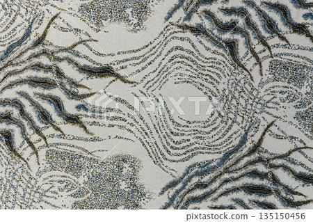 Light beige-gray jacquard fabric texture with metallic lurex and blue-gray abstract pattern, textile collection Light beige-gray jacquard fabric texture with metallic lurex and blue-gray abstract pattern, textile collection 135150456