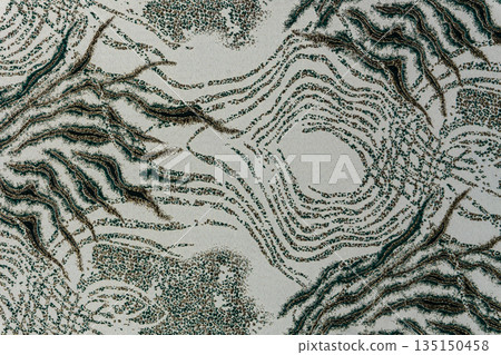 Light olive-gray jacquard fabric texture with metallic lurex and dark teal abstract pattern, textile collection Light olive-gray jacquard fabric texture with metallic lurex and dark teal abstract pattern, textile collection 135150458