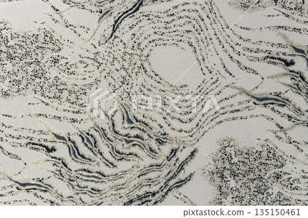Light beige jacquard fabric texture with metallic lurex and dark graphite abstract pattern, textile collection Light beige jacquard fabric texture with metallic lurex and dark graphite abstract pattern, textile collection 135150461