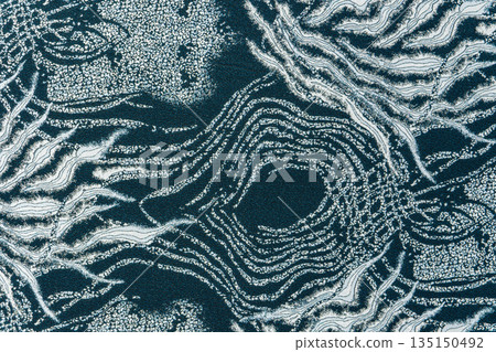 Petrol blue jacquard fabric texture with metallic lurex and abstract wave pattern, part of textile collection Petrol blue jacquard fabric texture with metallic lurex and abstract wave pattern, part of textile collection 135150492