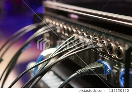 Switching stage equipment on the stage of a concert hall Switching stage equipment on the stage of a concert hall 135150550