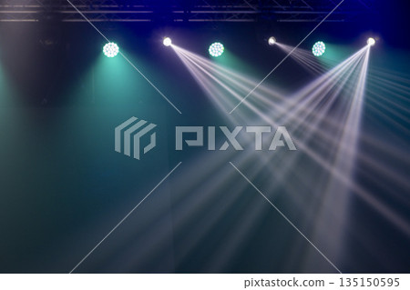 Light from stage lighting equipment in a concert hall Light from stage lighting equipment in a concert hall 135150595