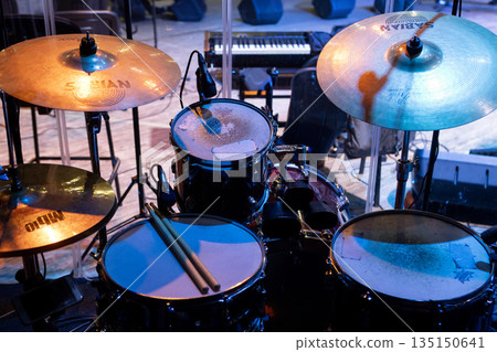 drum kit on stage before a concert drum kit on stage before a concert 135150641