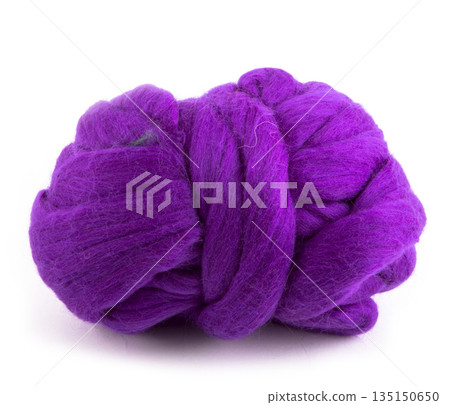 Skein of merino wool purple color on a white background Skein of merino wool purple color on a white background 135150650