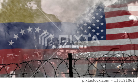 usa and venezuela flags behind barbed wire against a smoke background 135151061