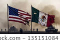 flags of the usa and mexico against the backdrop of tanks and smoke 135151084