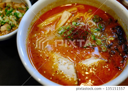A delicious bowl of traditional Japanese ramen with pork, egg, noodles, and flavorful broth. A delicious bowl of traditional Japanese ramen with pork, egg, noodles, and flavorful broth. 135151557