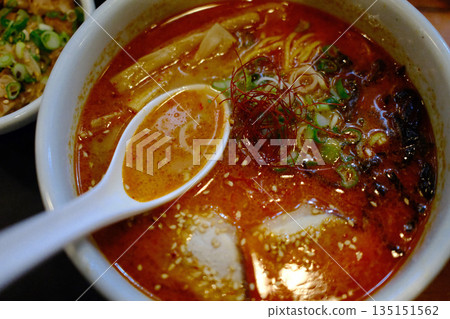 A delicious bowl of traditional Japanese ramen with pork, egg, noodles, and flavorful broth. A delicious bowl of traditional Japanese ramen with pork, egg, noodles, and flavorful broth. 135151562
