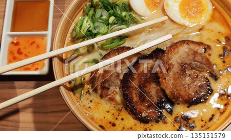 Steaming Hot Bowl of Traditional Japanese Ramen 135151579