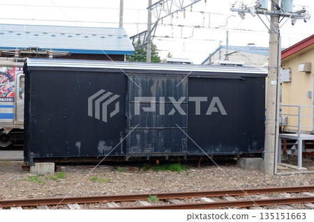 Disused freight cars used as storage at Hiraga Station 135151663