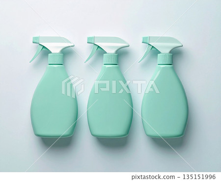 Cleaning concept. Green sprays in a row on a white background. Disinfectant, glass cleaner, all-purpose surface cleaner. Mockup for branding cleaning product. 135151996