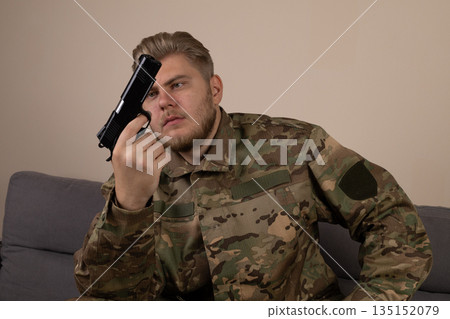 Soldier in uniform looking through binoculars. Soldier in uniform looking through binoculars. 135152079