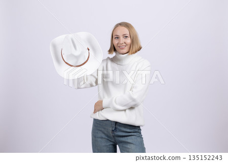 Woman holding a framed empty white board for copy space. 135152243