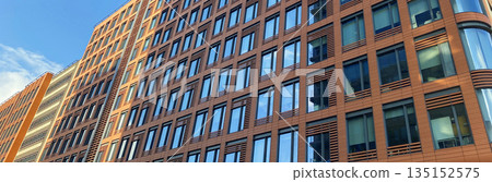 Architecture and real estate, modern residential apartment building with large panoramic windows 135152575
