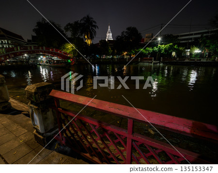 Wat Paknam Phasi Charoen seen from the city at night, Bangkok, Thailand 135153347
