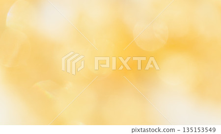 A calm yellow-brown background image with yellow bokeh and a blurred gradation A calm yellow-brown background image with yellow bokeh and a blurred gradation 135153549